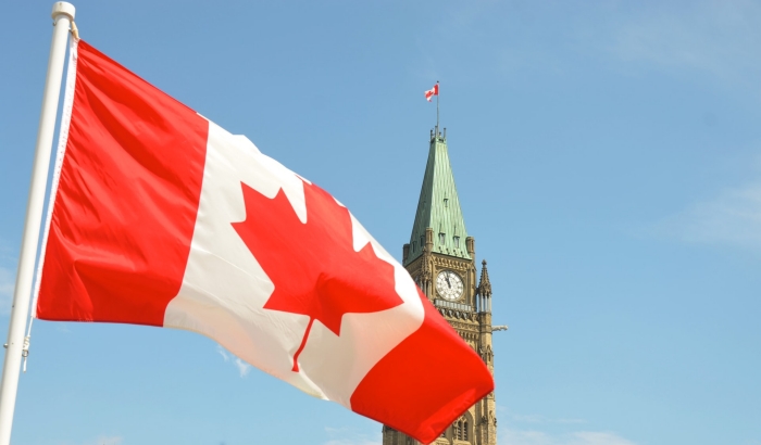 canada_flag_parliament-jason-hafso-C2keINMOhIE-unsplash